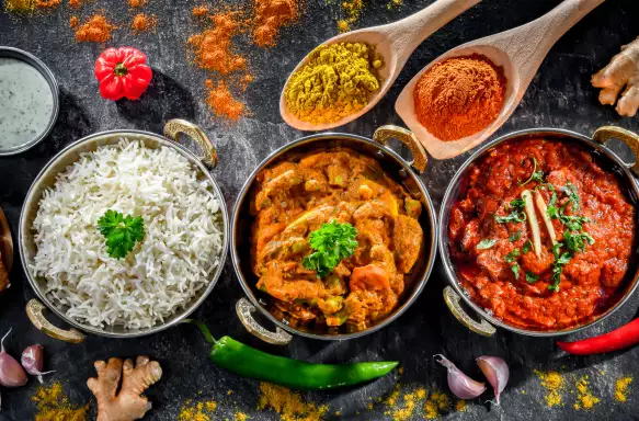 Hot madras paneer and vegetable masala with rice AdobeStock 570854650.jpeg Main home